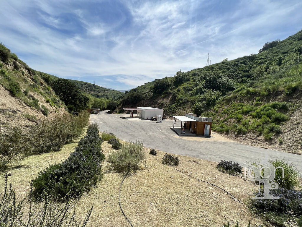 Gas Station / Small Town Shops /Open Land - RA3164